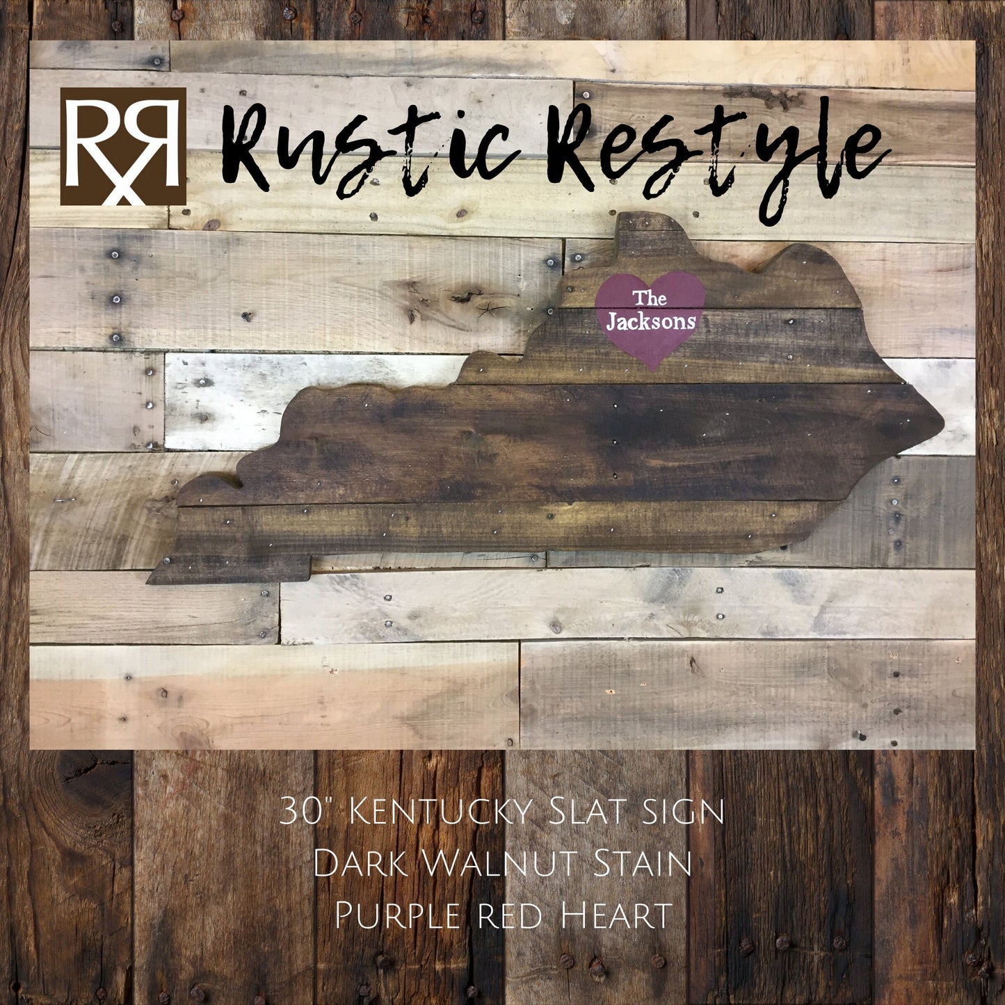 Kentucky-shaped wood sign hanging on a wood wall. Horizontal wood slats with nail holes showing. A purple red heart is painted near the upper middle with the name The Jacksons painted on it in white.