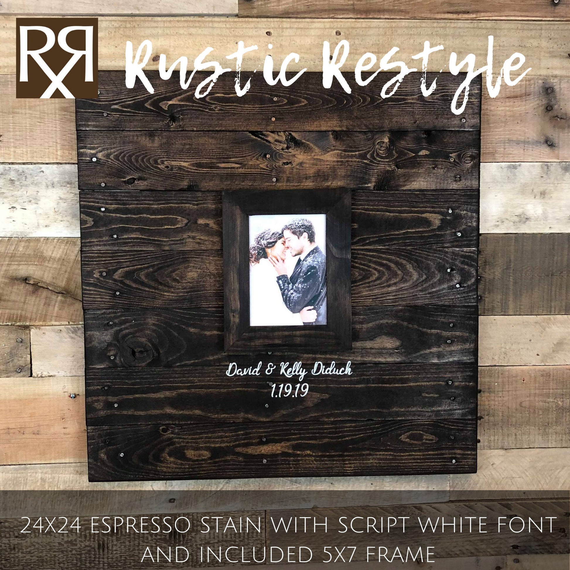 24 inch by 24 inch square dark wood wedding sign with matching frame and script font white wedding names and date hanging on a unfinished wood pallet wall.