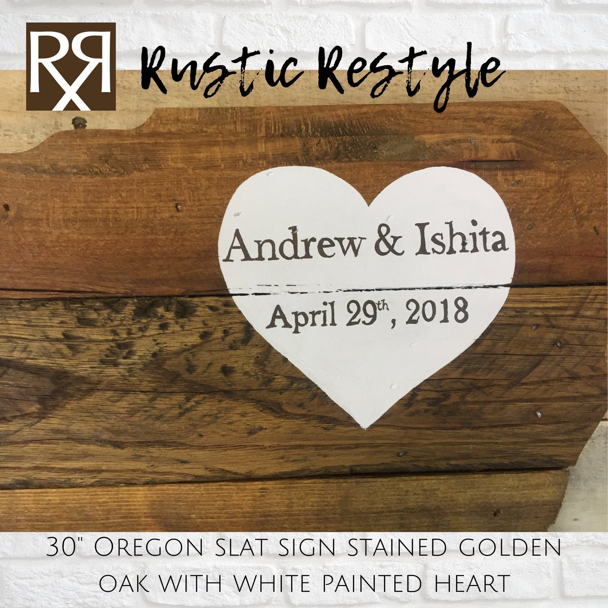 close up of wood sign shaped like Oregon,  boards hanging on a rustic wood pallet wall with a  White heart painted in the upper right corner with personalization Andrew & Ishita