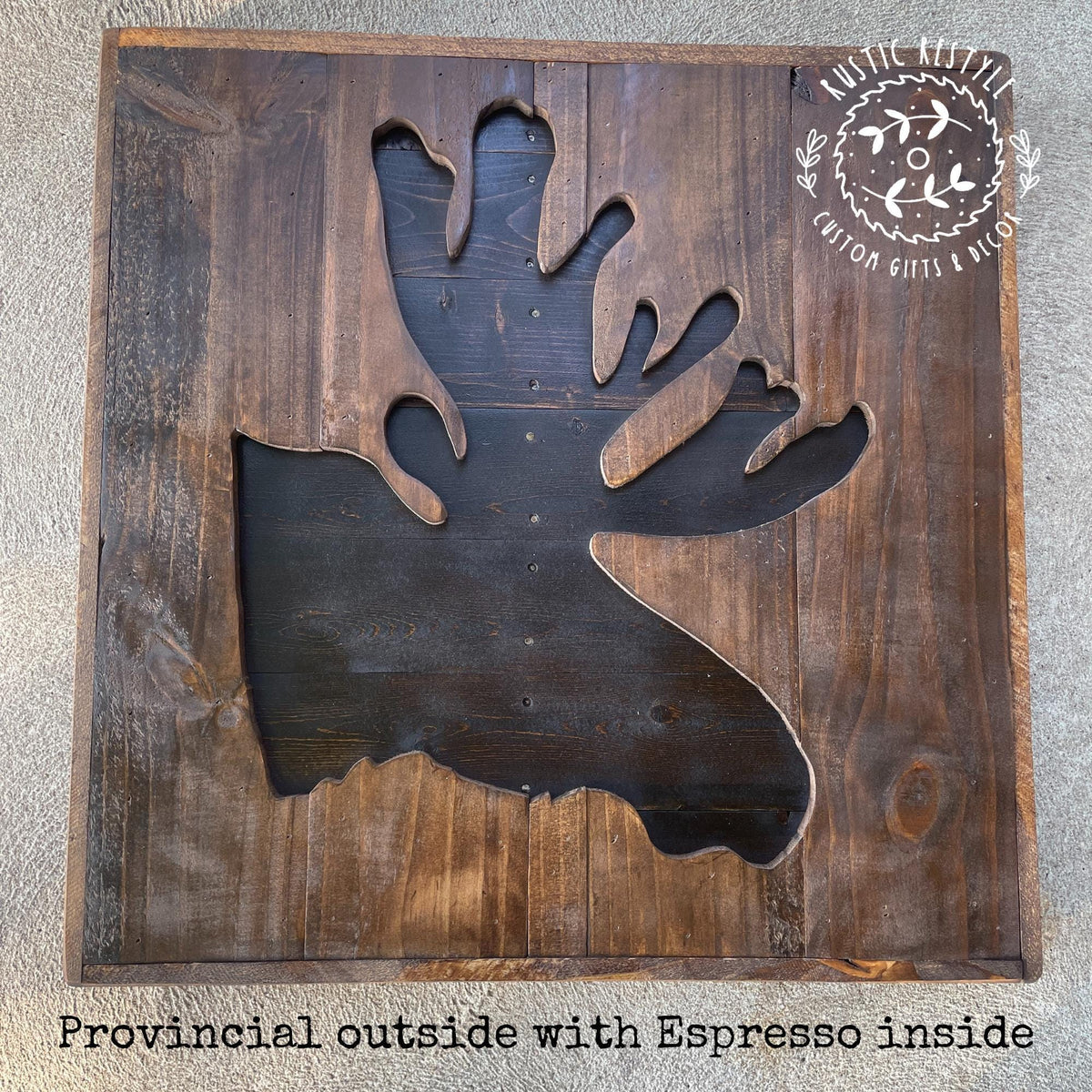 a wooden cutout of a moose head, with the word "Espresso" written inside the cutout.