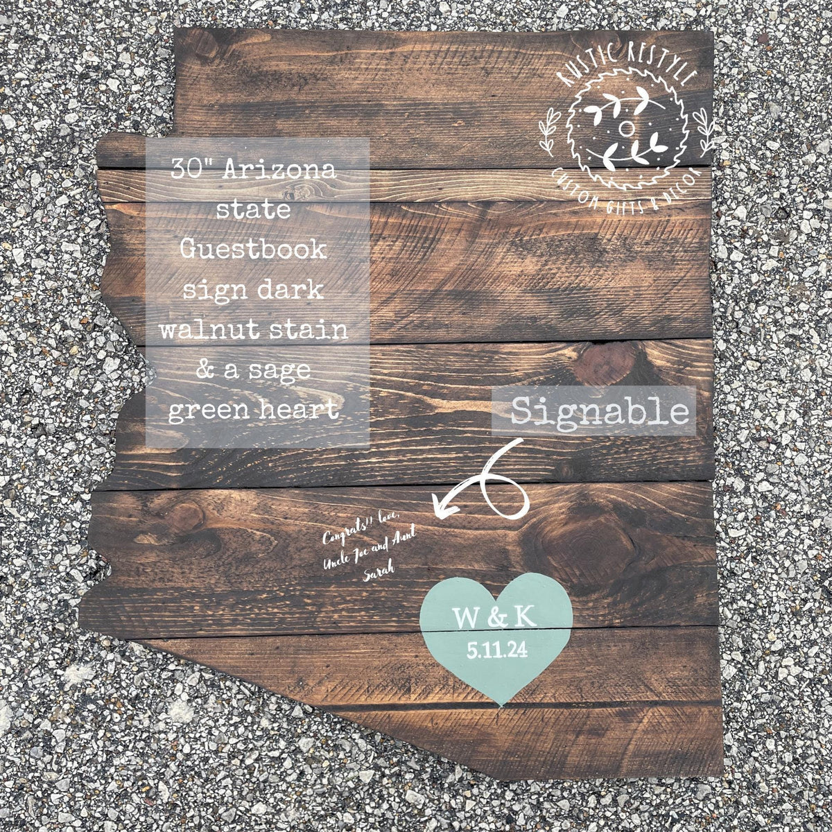 The image is a wooden sign depicting the state of Arizona, with a heart symbol and text indicating it is a guestbook sign.