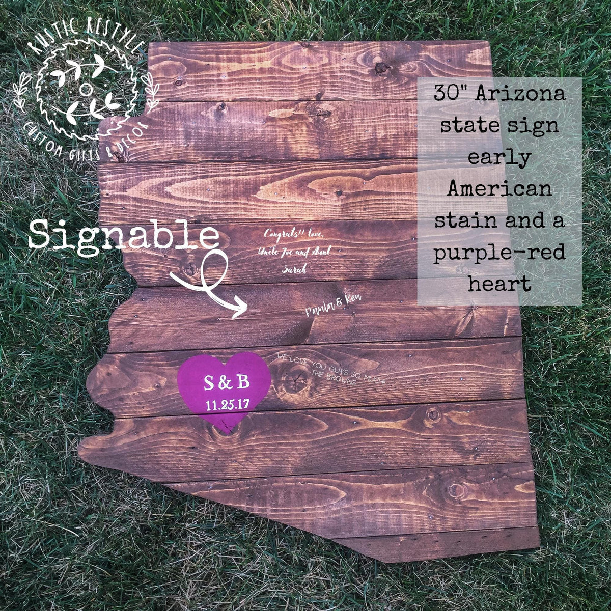 The image is a wooden sign with a heart-shaped cutout, placed on a grassy surface.